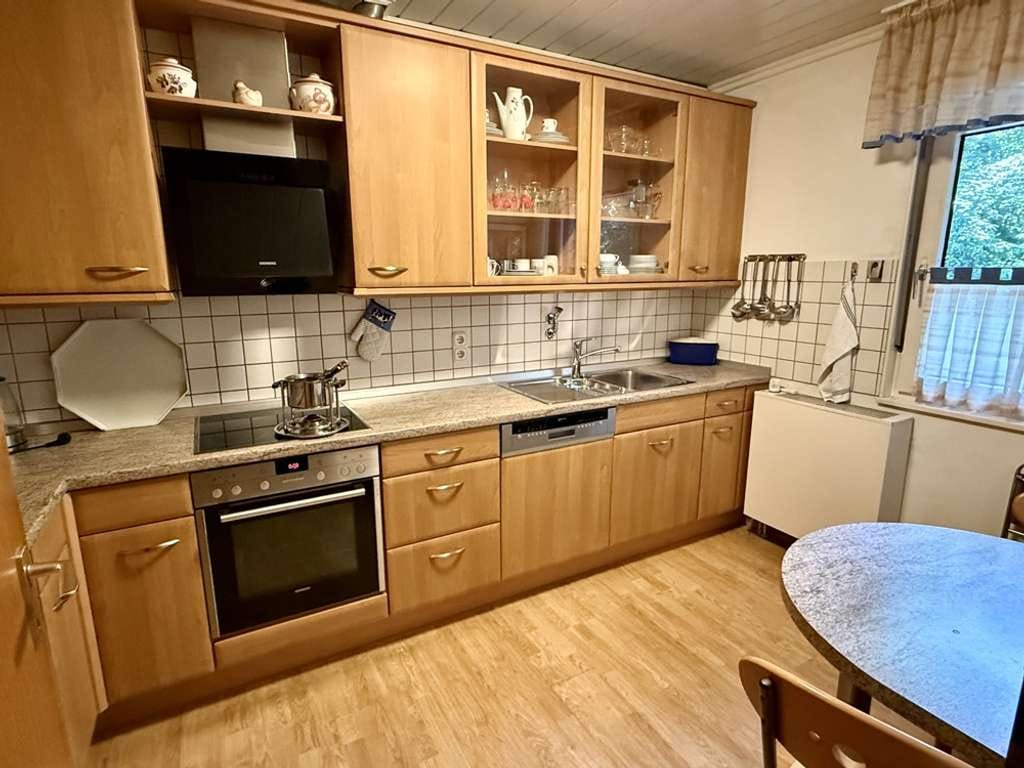 Immobilie in Coesfeld - Bungalow in ruhiger Sackgassenlage mit großem Westgrundstück, Keller und Garage - Bild 4