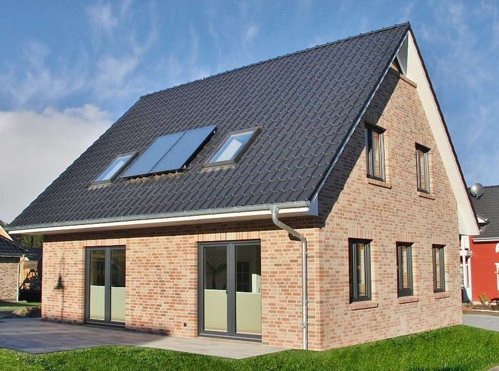 Immobilie in Hartenholm - Junges Wohnkonzept im klassischen Einfamilienhaus Niedrigenergiehaus EH40 mit Wärmepumpe und PV-Anlage  Neubauplanung - Bild 2