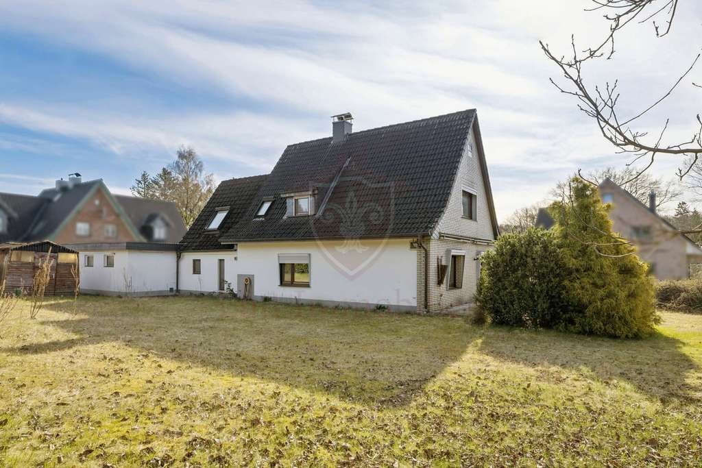 Immobilie in Hartenholm - ***Handwerker aufgepasst - Gepflegtes Siedlungshaus auf traumhaftem Grundstück*** - Bild 1