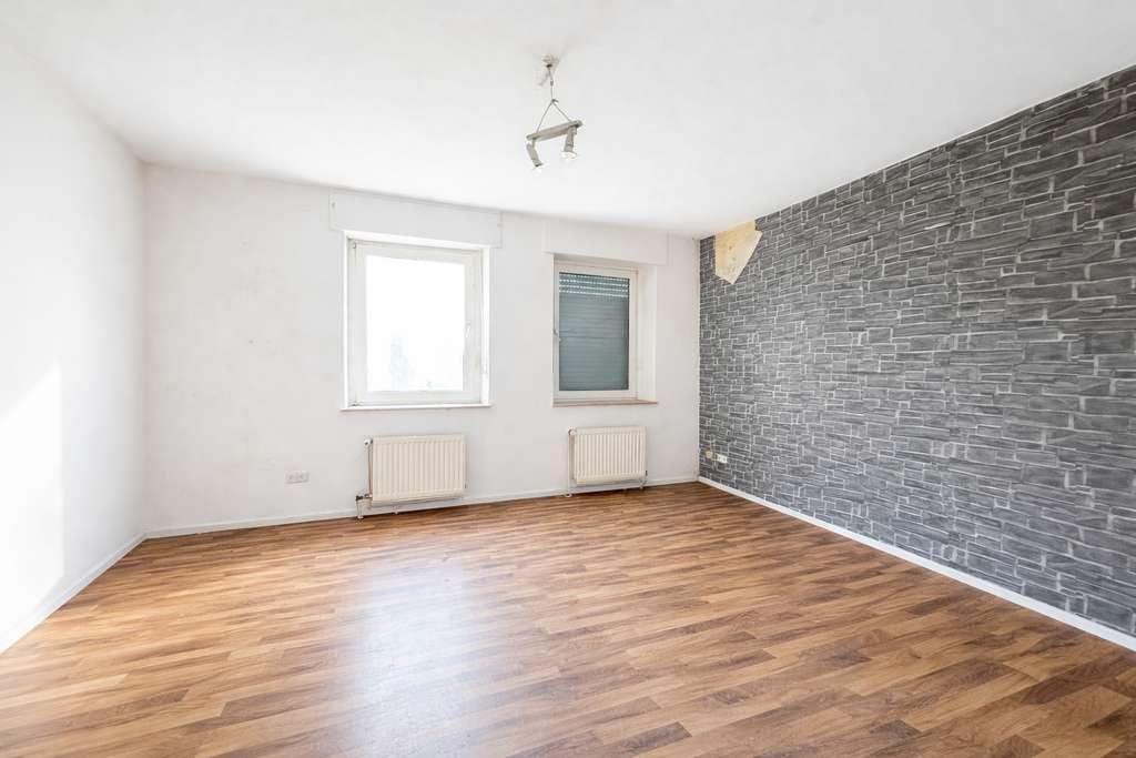 Immobilie in Herne - Sanierungsbedürftige Eigentumswohnung mit Terrasse - Innenstadtlage - Bild 1