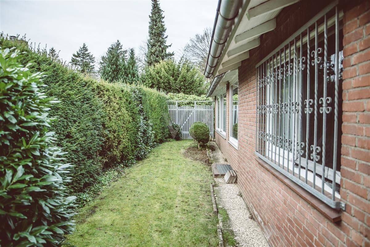 Immobilie in Lüneburg - Bungalow am Kreideberg mit Wintergarten, gepflegter Außenanlage und Ausblick ins Grüne - Bild 3