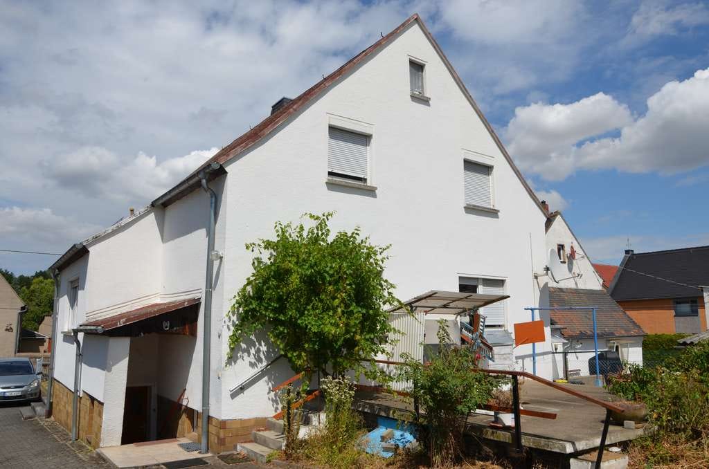 Immobilie in Grimma - Einfamilienhaus mit zwei Garagen in ruhiger Siedlungslage von Grimma OT Großbothen - Bild 1