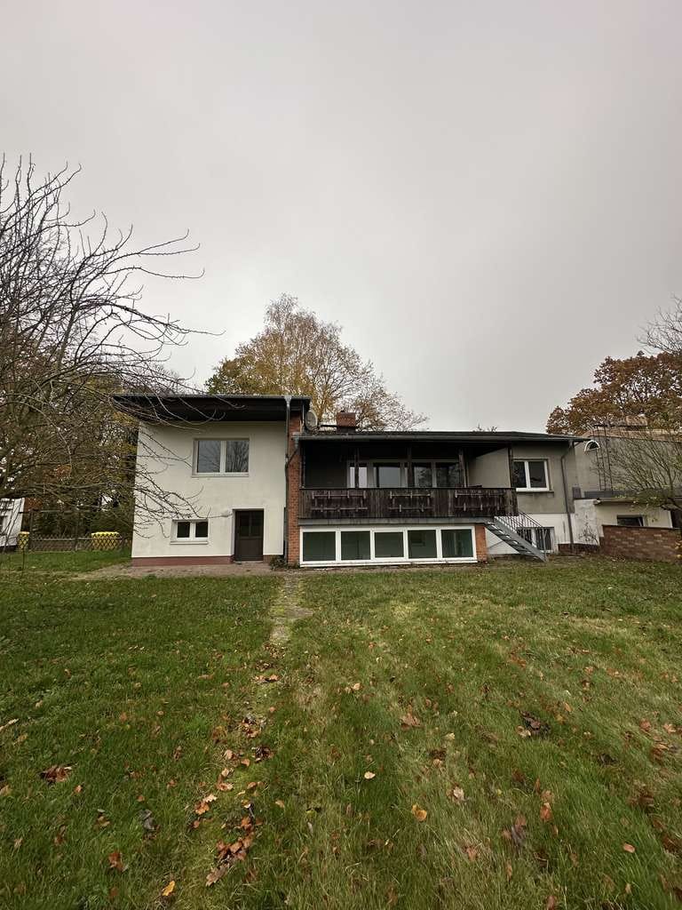 Immobilie in Dummerstorf - Sanierungsbedürftiges Einfamilienhaus mit Einliegerwohnung, großem Grundstück, Werkstatt und Garage - Bild 0