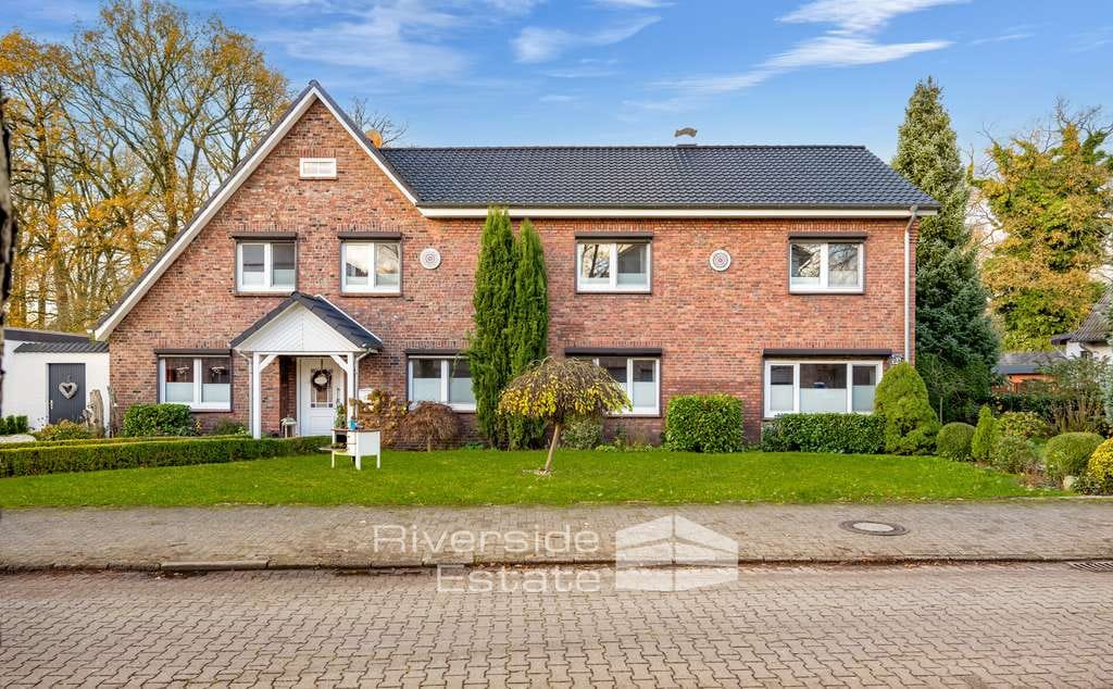 Immobilie in Lauenbrück - Mehrfamilienhaus mit großem Garten und vielseitigen Optionen – ideal fürs Mehrgenerationenwohnen - Bild 3