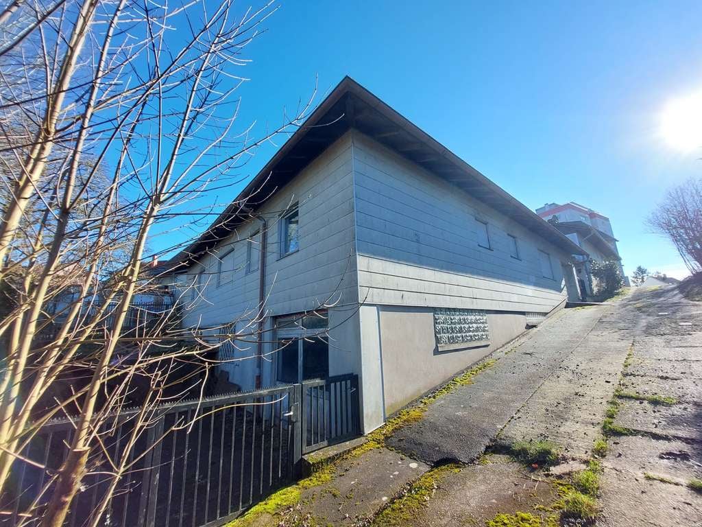 Immobilie in Pirmasens - Gebäudeensemble mit Einfamilienhaus, Wohn- und Geschäftshaus,  Doppelhaushälfte und Nebengebäuden - Bild 4