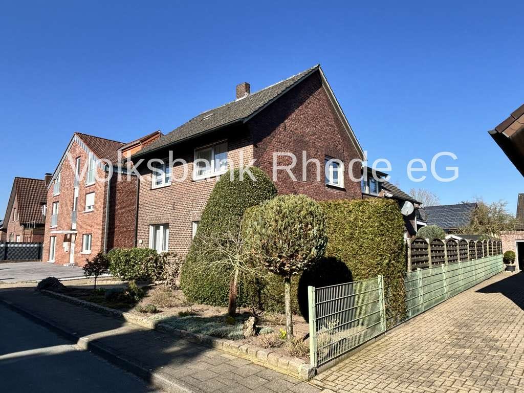 Immobilie in Rhede - Attraktives Zweiparteienhaus mit schönem Garten, Teich, Balkon in ruhiger Lage von Rhede - Bild 2