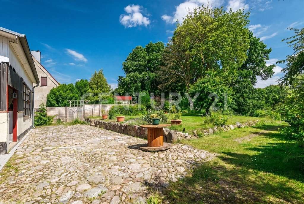 Immobilie in Schwaan - Vollunterkellertes Einfamilienhaus mit Kamin und Carport - Bild 3
