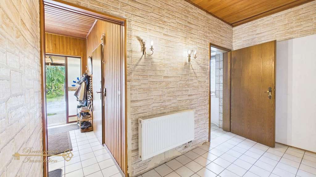 Immobilie in Achim - Achim - Uesen • Großzügiges Zweifamilienhaus mit 4 Garagen & Wintergarten - Bild 1