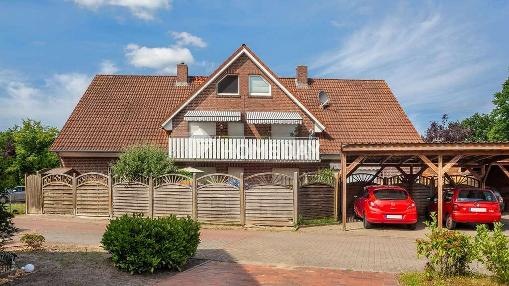 Immobilie in Menslage - Mehrfamilienhaus mit 4 Wohneinheiten, Garten, Dachboden, Carports und ca. 360 m² Wohnfläche - Bild 4