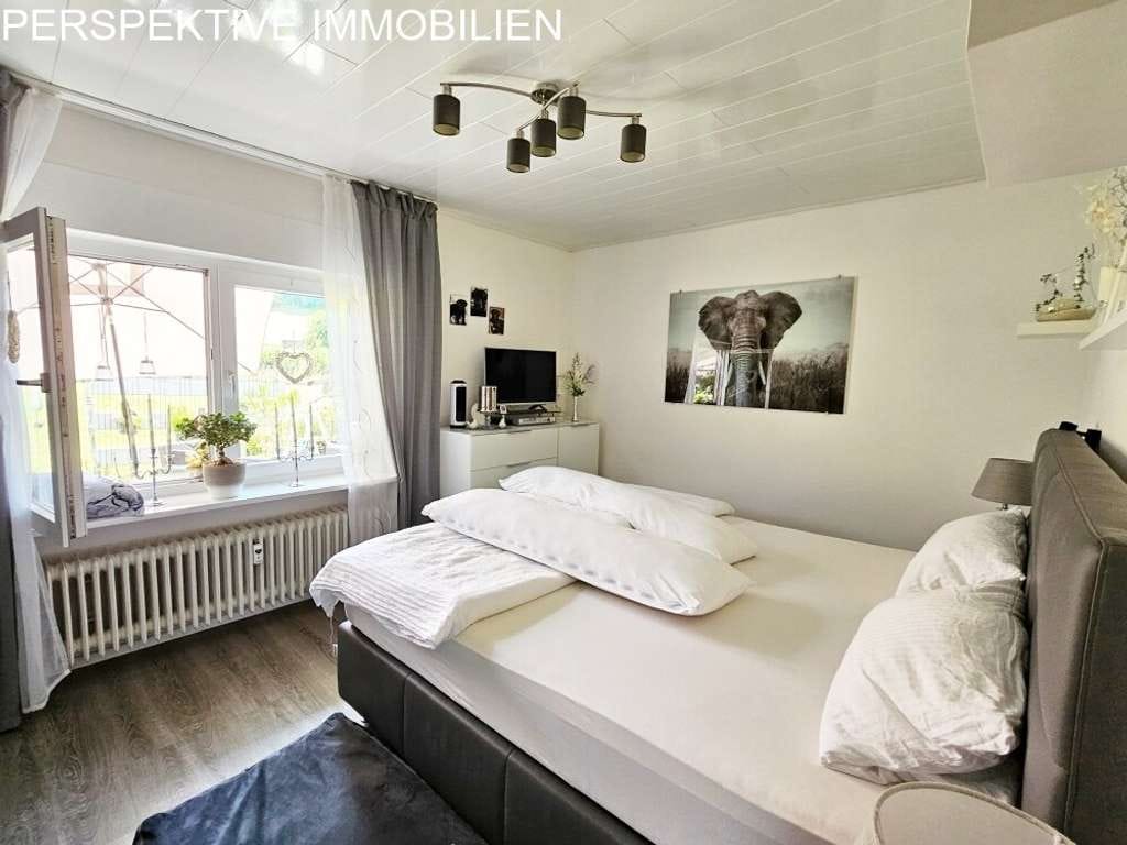 Immobilie in Bad König - Vermietetes Mehrfamilienhaus + Baugrundstück und Garagen - Bild 3