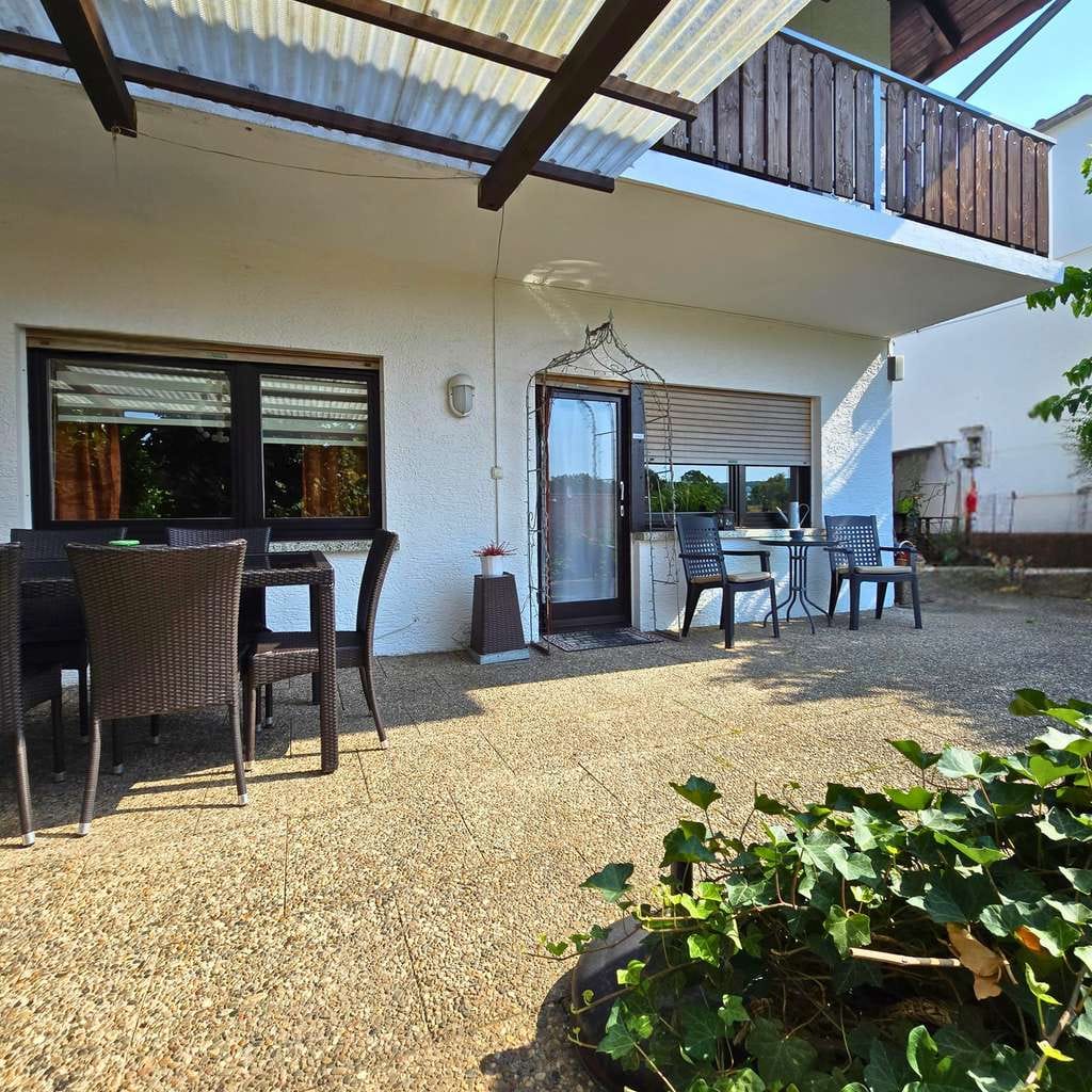 Immobilie in Lollar - Wohnen mit Weitblick: Vier-Familienhaus mit Terrasse, Gartenoase & flexiblen Nutzungsmöglichkeiten - Bild 4