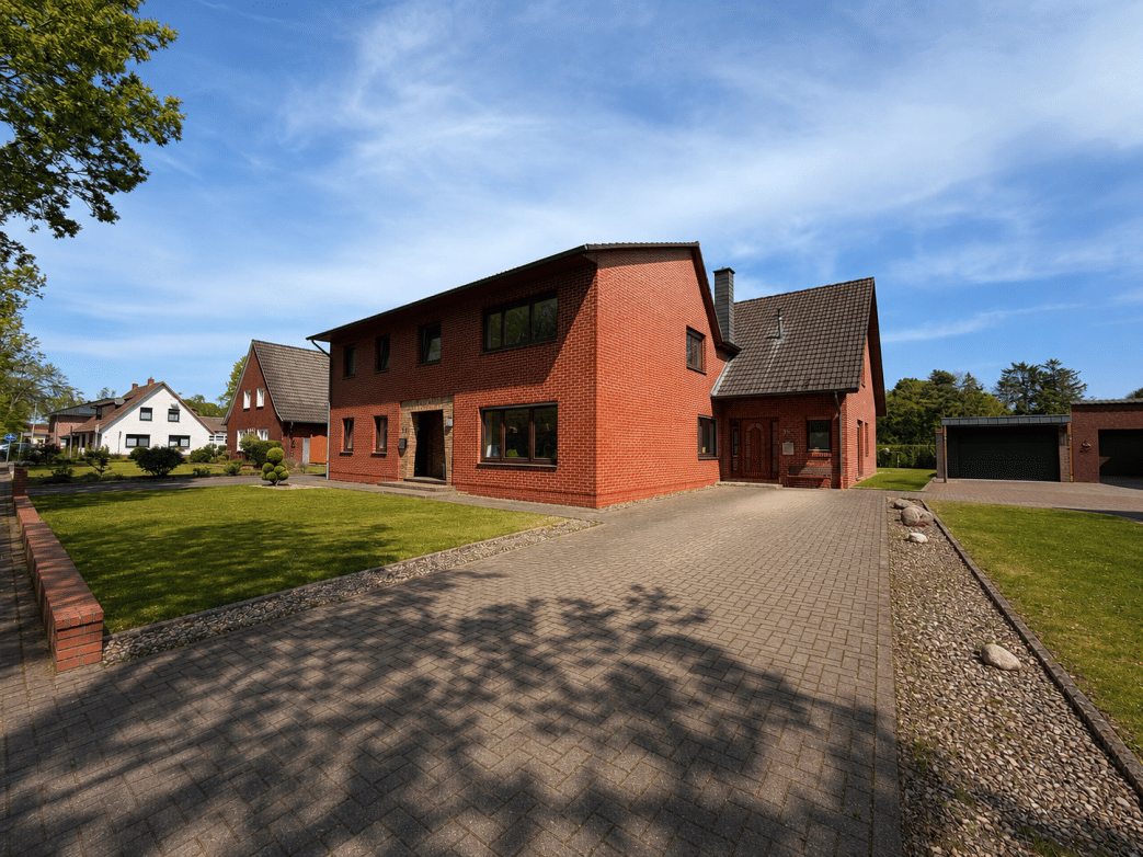 Immobilie in Garrel - Wohnen im Grünen - Charmantes Haus mit großem Garten und Nebenwohnung - Bild 1