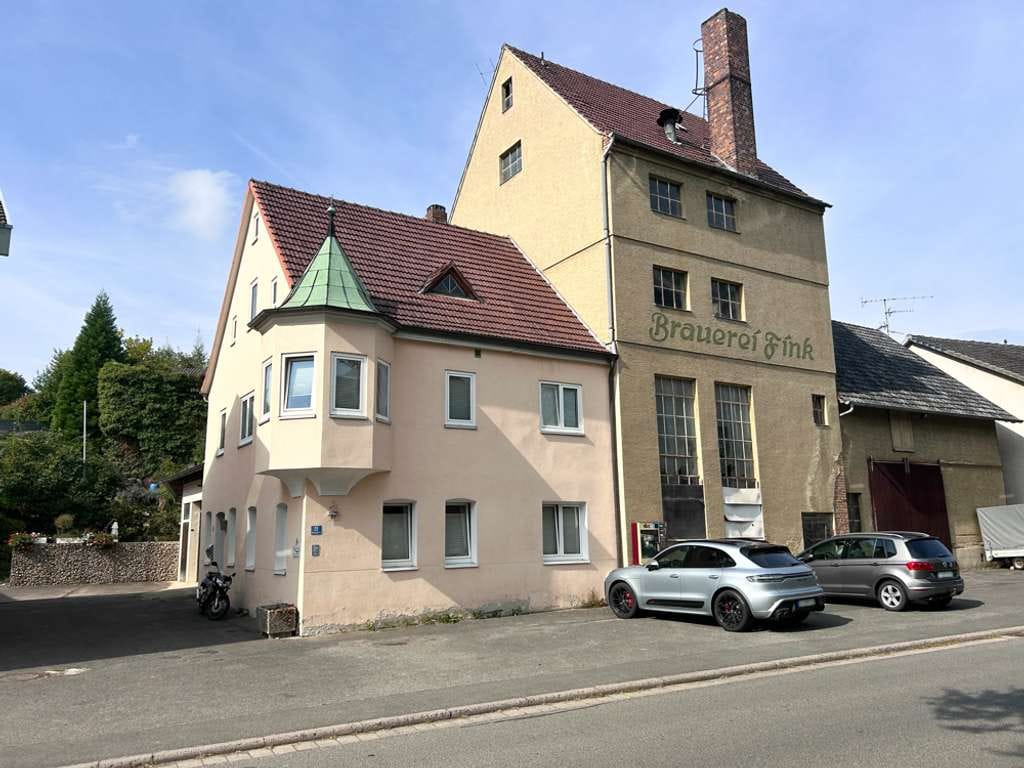 Immobilie in Meeder - Mehrfamilienhaus mit moderner Praxis und ehemaliger Brauerei auf großzügigem Grundstück in Meeder! - Bild 2