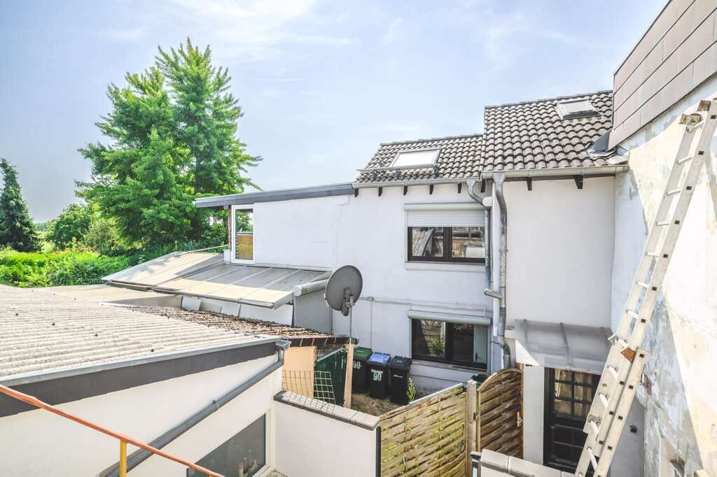 Immobilie in Würselen - Siedlungshaus mit 2 Wohneinheiten und schönem Garten - Bild 1