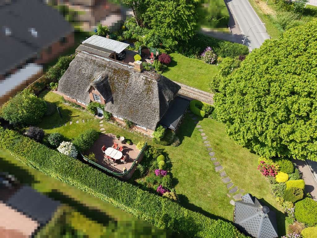 Immobilie in Risum-Lindholm - Traumhafte Friesenkate mit liebevoll angelegtem Garten - Bild 3
