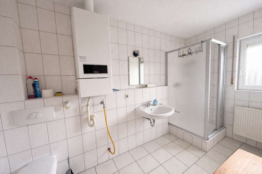 Immobilie in Saarlouis - Charmante 1-Zimmer-Wohnung mit Balkon und Weitblick in Saarlouis-Roden! - Bild 4