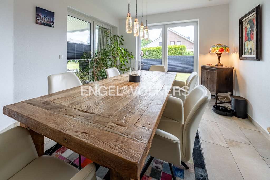 Immobilie in Esterwegen - Familienfreundlicher Bungalow mit Terrassen, Gartenblick & viel Platz - Bild 1