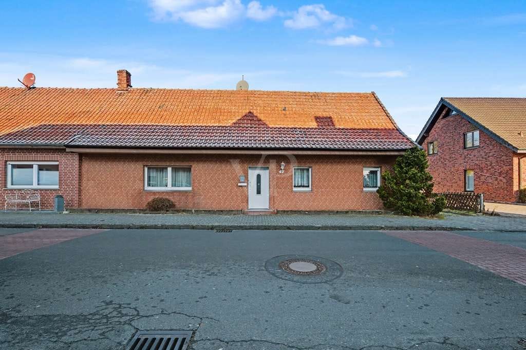 Immobilie in Ochtrup - Kleines Einfamilienhaus mit großem Grundstück - Bild 1