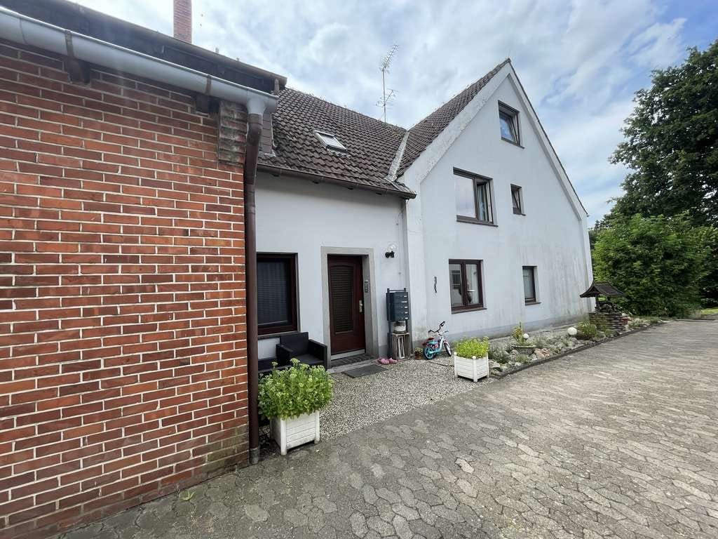 Immobilie in Loxstedt - Kapitalanlage mit Potenzial: Mehrfamilienhaus und Gewerbeeinheit im Angebot - Bild 2