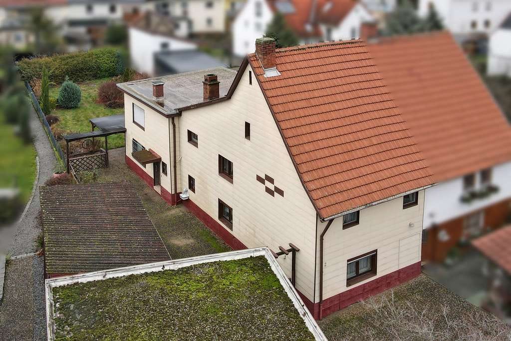Immobilie in Hemsbach - Doppelhaushälfte mit großem Garten & Ausbaupotenzial in begehrter Lage von Hemsbach - Bild 0
