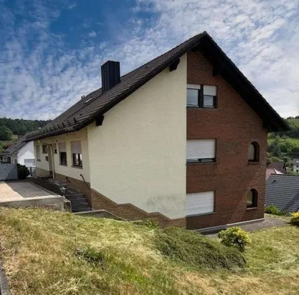 Immobilie in Rothenbuch - Großzügiges Einfamilienhaus mit Einliegerwohnung in sonniger, ruhiger Lage mit herrlicher Aussicht  - Bild 1