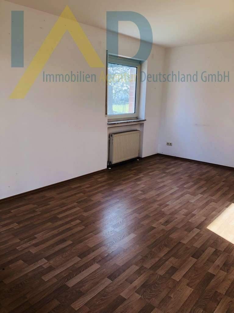 Immobilie in Lollar - Lichtdurchflutete 3-Zimmer-Wohnung mit Terrasse und Tiefgaragenstellplatz - Bild 2