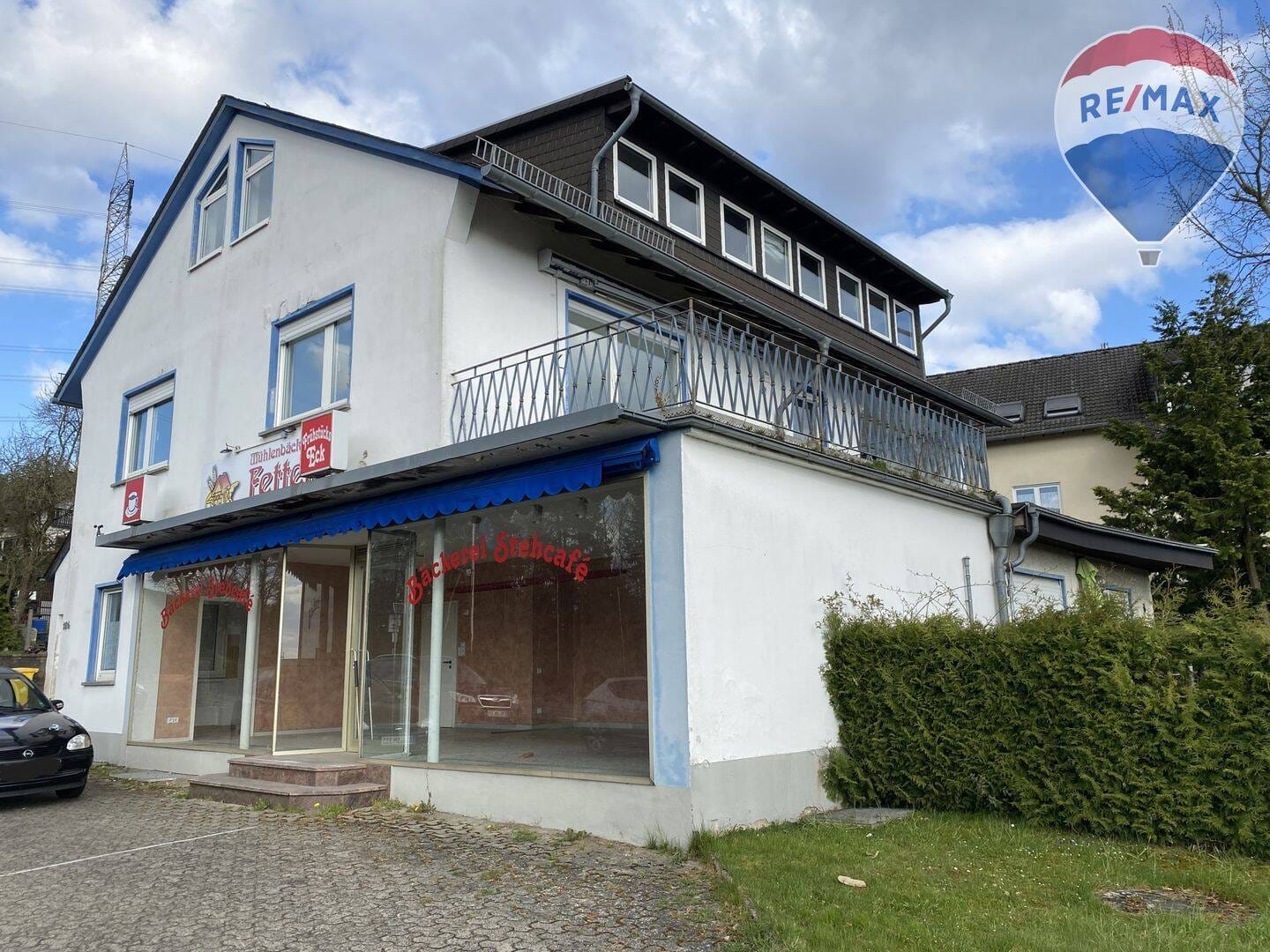 Immobilie in Holzappel - Mehrfamilienhaus mit Ladengeschäft und Halle - Bild 0