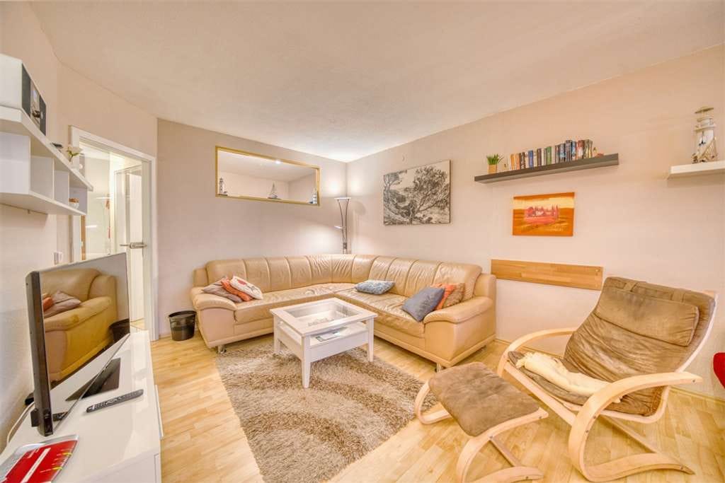 Immobilie in Heiligenhafen - Familienfreundliche Ferienwohnung in Top-Lage am Ostseestrand - Bild 1