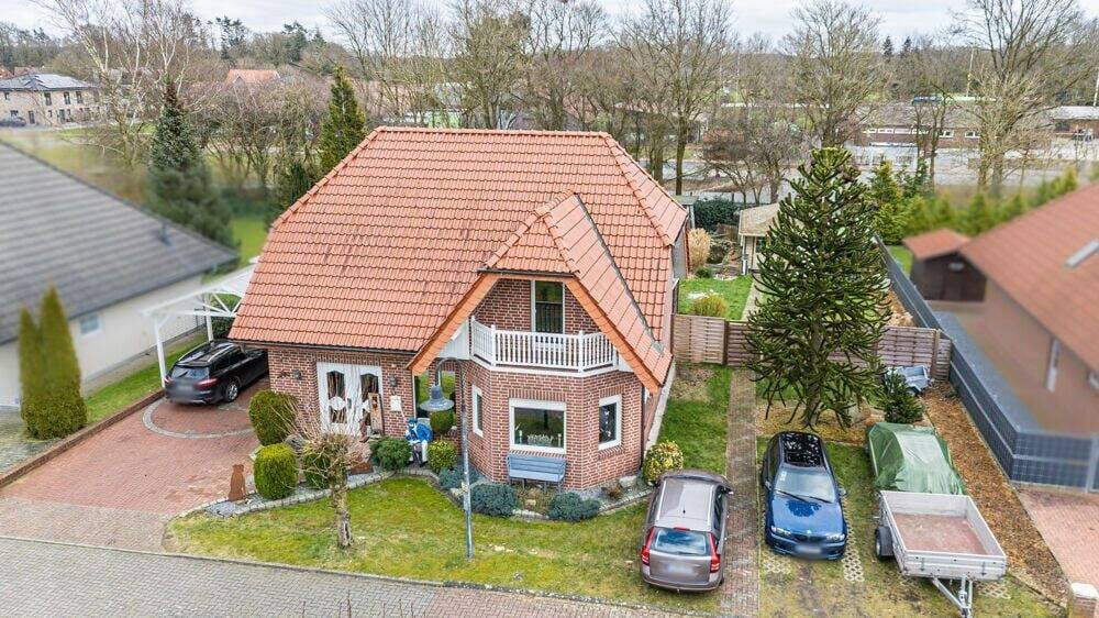 Immobilie in Niederlangen - Vermietetes Einfamilienhaus mit Garage, Carport, überdachter Terrasse und großem Gartenhaus! - Bild 0