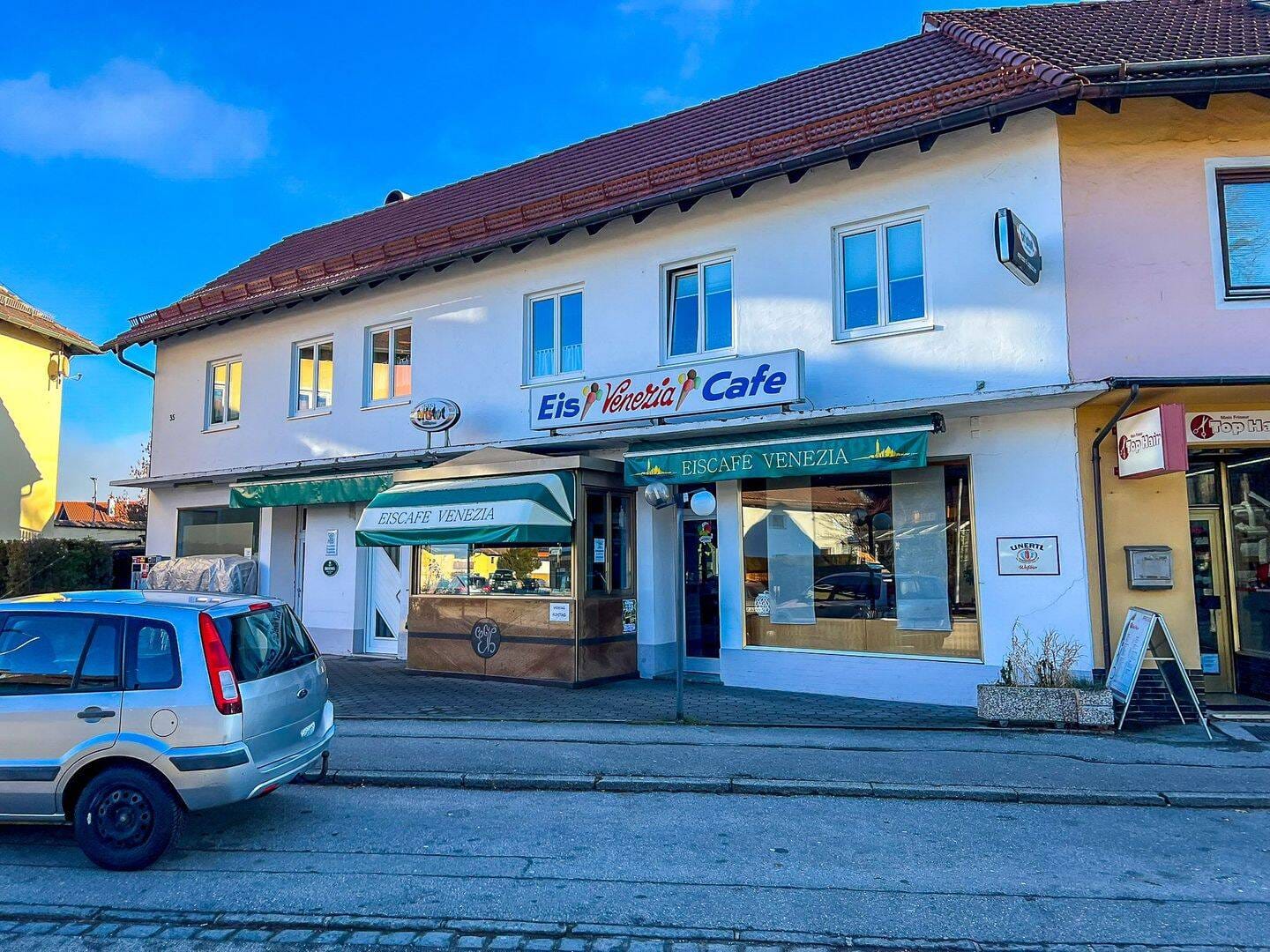 Immobilie in Peißenberg - Große Wohnung im 1. & 2. Obergeschoss mit beliebtem und komplett ausgestattetem Eiscafé - Bild 0