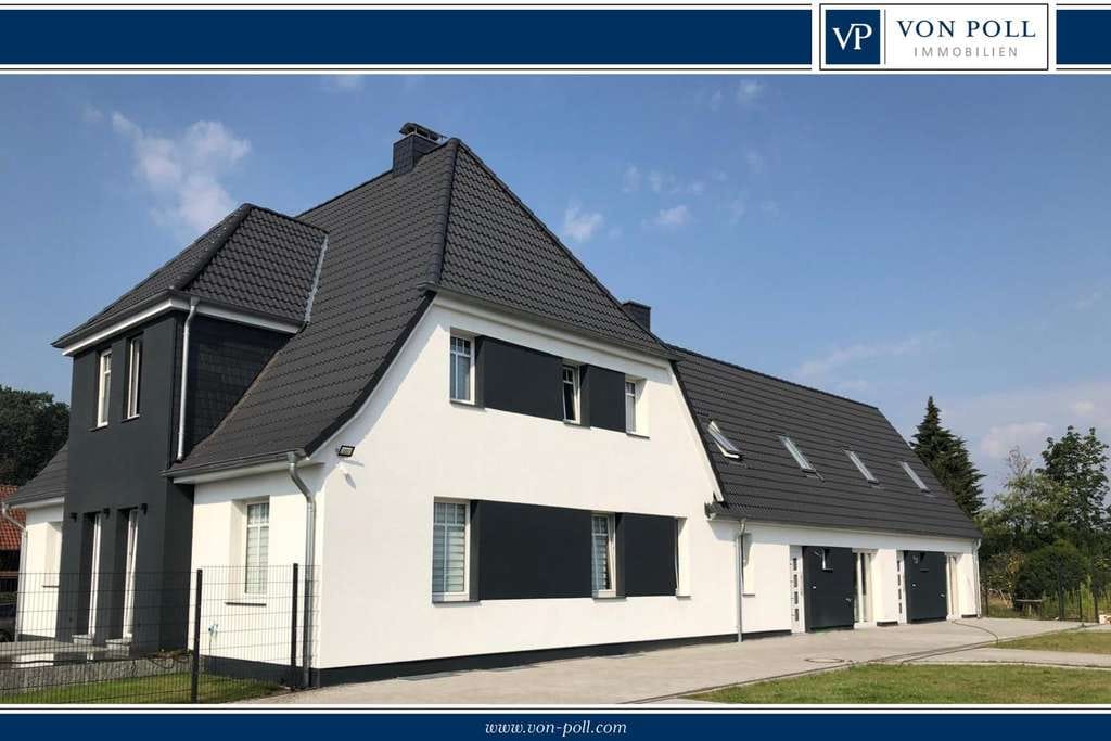 Immobilie in Groß Oesingen - SOLIDES MEHRFAMILIENHAUS MIT VIER WOHNEINHEITEN -  NACHHALTIG MODERNISIERT UND VOLL VERMIETET - Bild 0