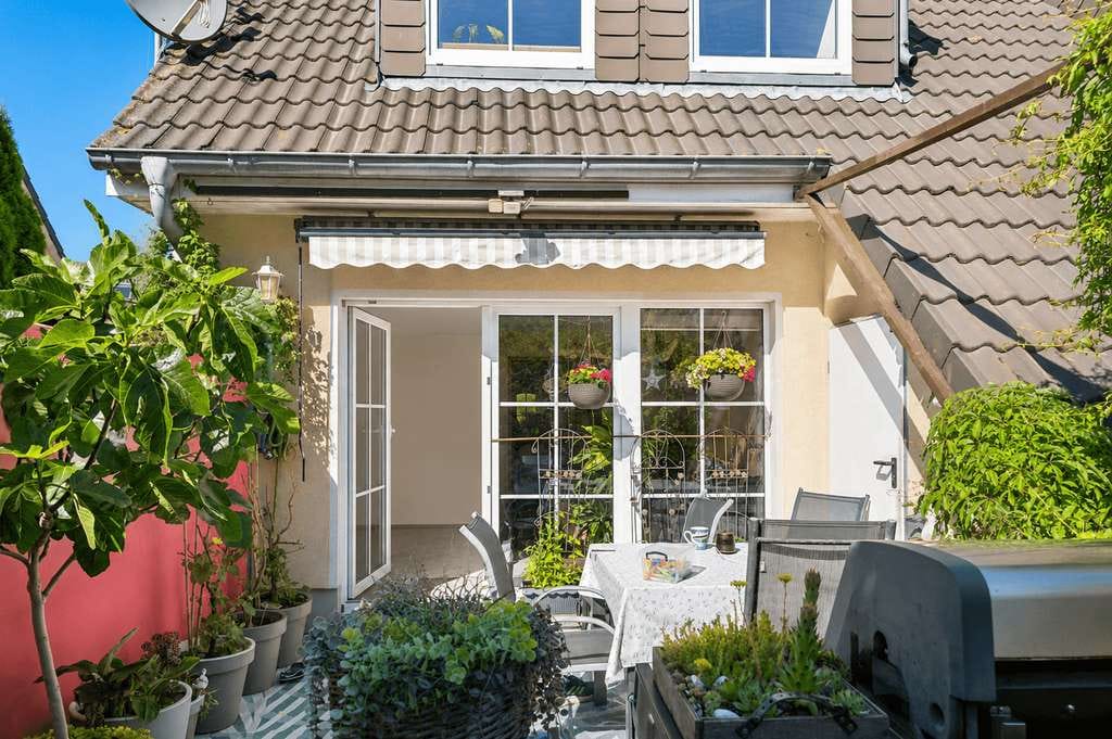 Immobilie in Börgerende-Rethwisch - Reihenendhaus in Börgerende – Garten, Kamin, strandnah und mit Entwicklungspotenzial - Bild 1
