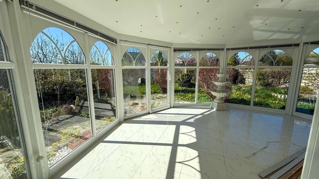 Immobilie in Mittelangeln - Wohnhaus mit südländischem Flair! Wohnhaus mit Doppelgarage, Wintergarten und Dachterrasse - Bild 1