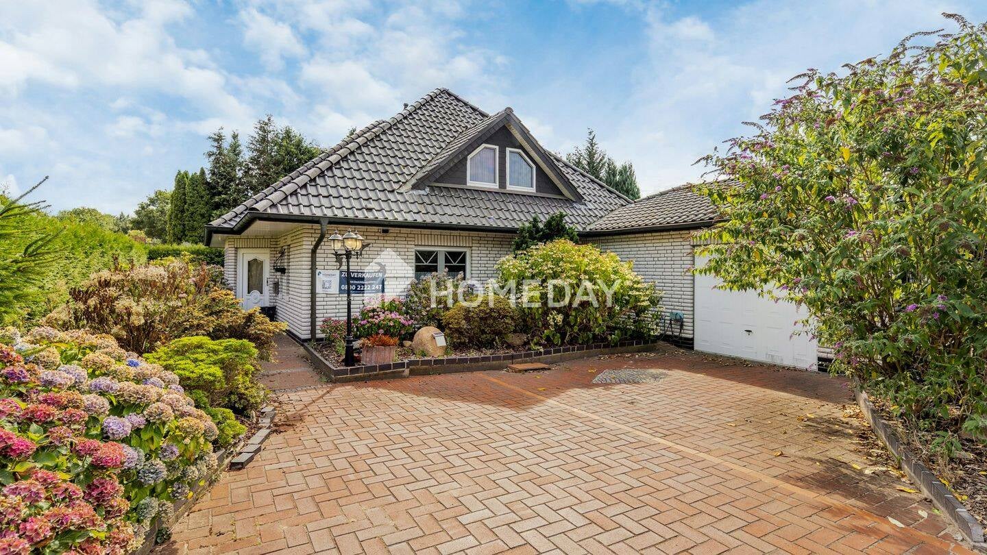 Immobilie in Lähden - Großzügiger Bungalow mit Sauna, Wintergarten, Garage und Garten in Lähden-Holte-Lastrup - Bild 0