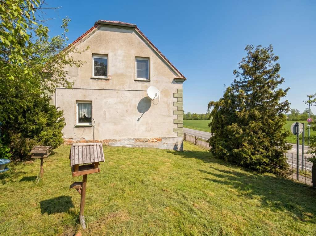 Immobilie in Niederfinow - Einfamilienhaus mit Nebengelass und weitem Blick über Wiesen und den Finowkanal - Bild 1