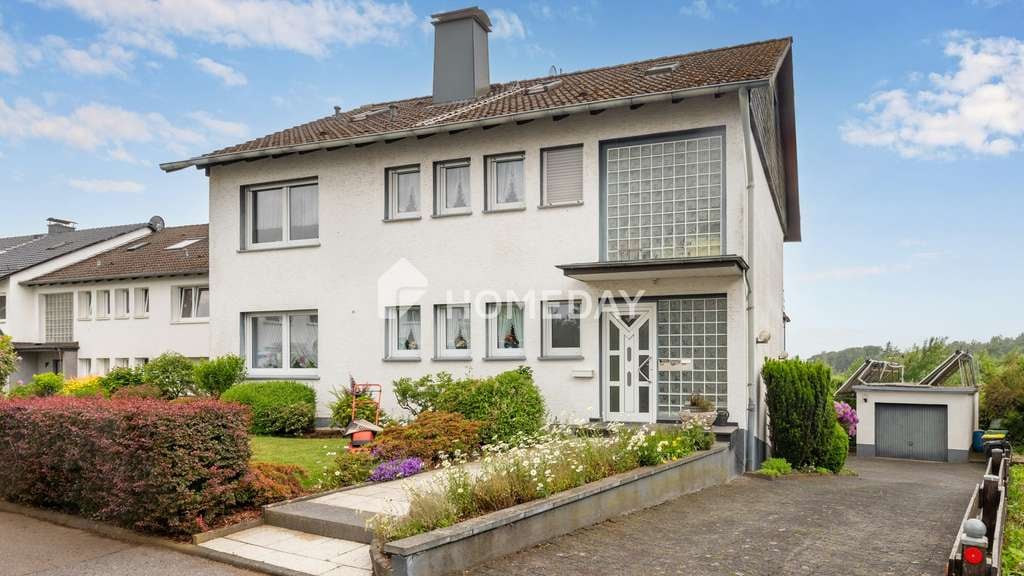 Immobilie in Schalksmühle - Vielseitiges Mehrfamilienhaus mit 3 WEs, großzügigem Garten und attraktiven Nutzungsmöglichkeiten - Bild 0