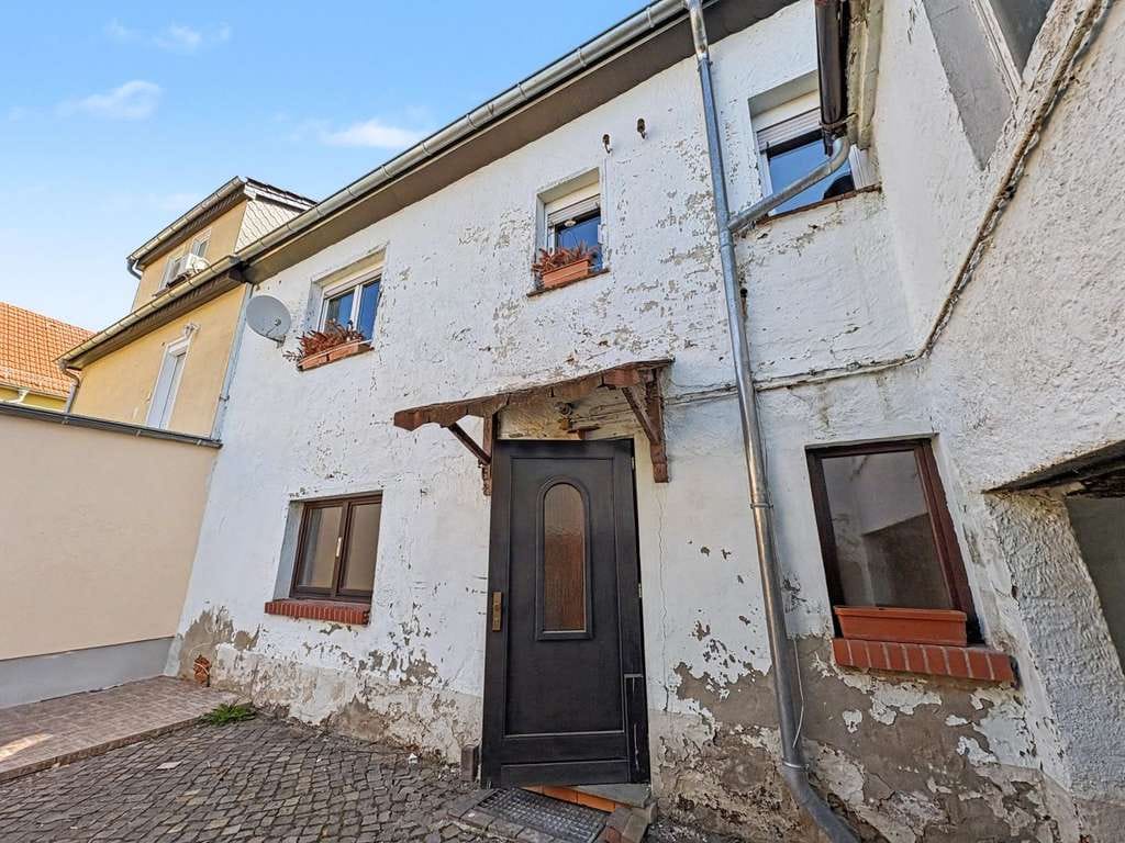 Immobilie in Eilenburg - Zentral gelegenes Reihenmittelhaus mit Entwicklungspotenzial und Innenhof in Eilenburg - Bild 2