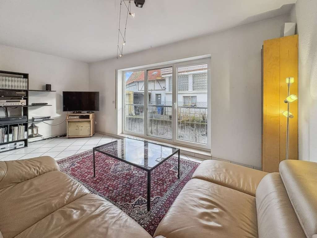 Immobilie in Ober-Ramstadt - Ober-Ramstadt: Gepflegte 2-Zimmer-Wohnung mit Tiefgaragenstellplatz und ruhigem Gemeinschaftsgarten - Bild 2
