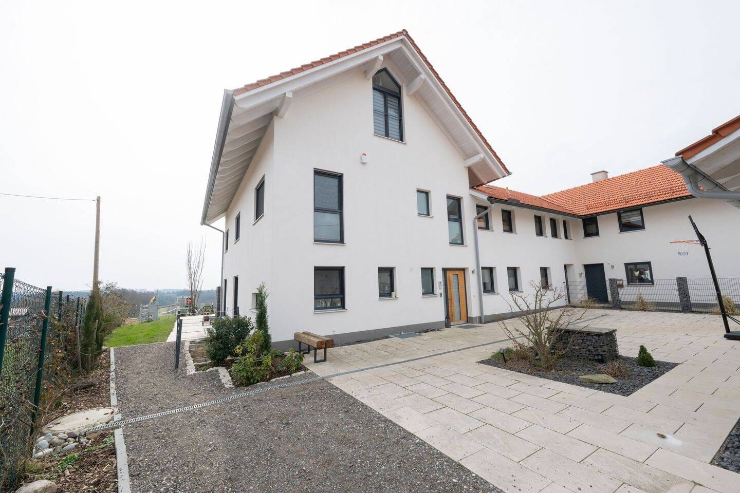 Immobilie in Kirchdorf - Modernes Luxus-Landhaus mit ELW und 180-Grad-Bergblick - Bild 1