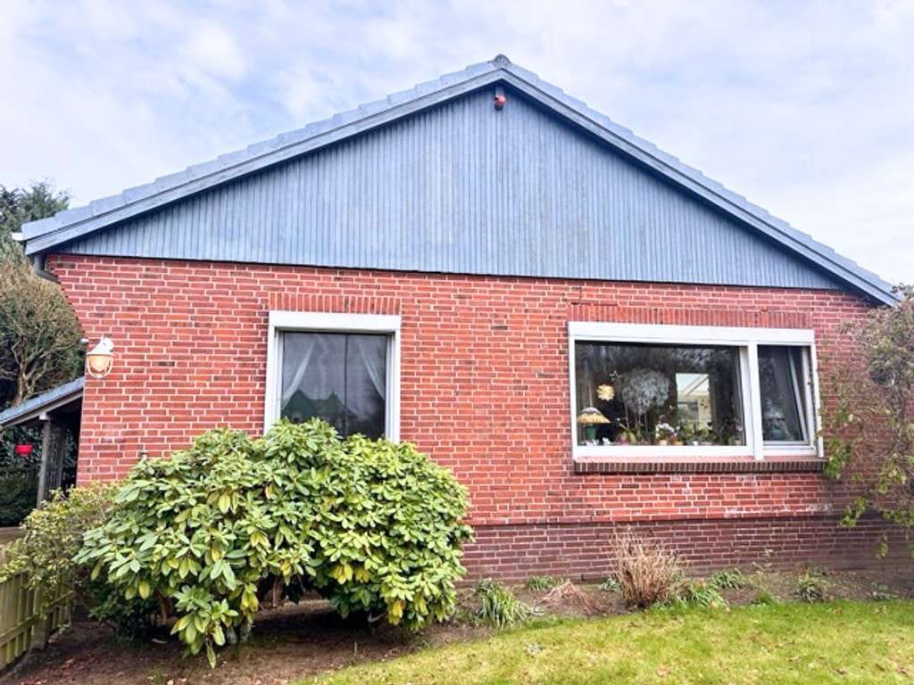 Immobilie in Lohe-Rickelshof - Ihr Haus in Lohe-Rickelshof: ebenerdiger Satteldach-Bungalow mit Einliegerwhg. in ruhiger Lage - Bild 2