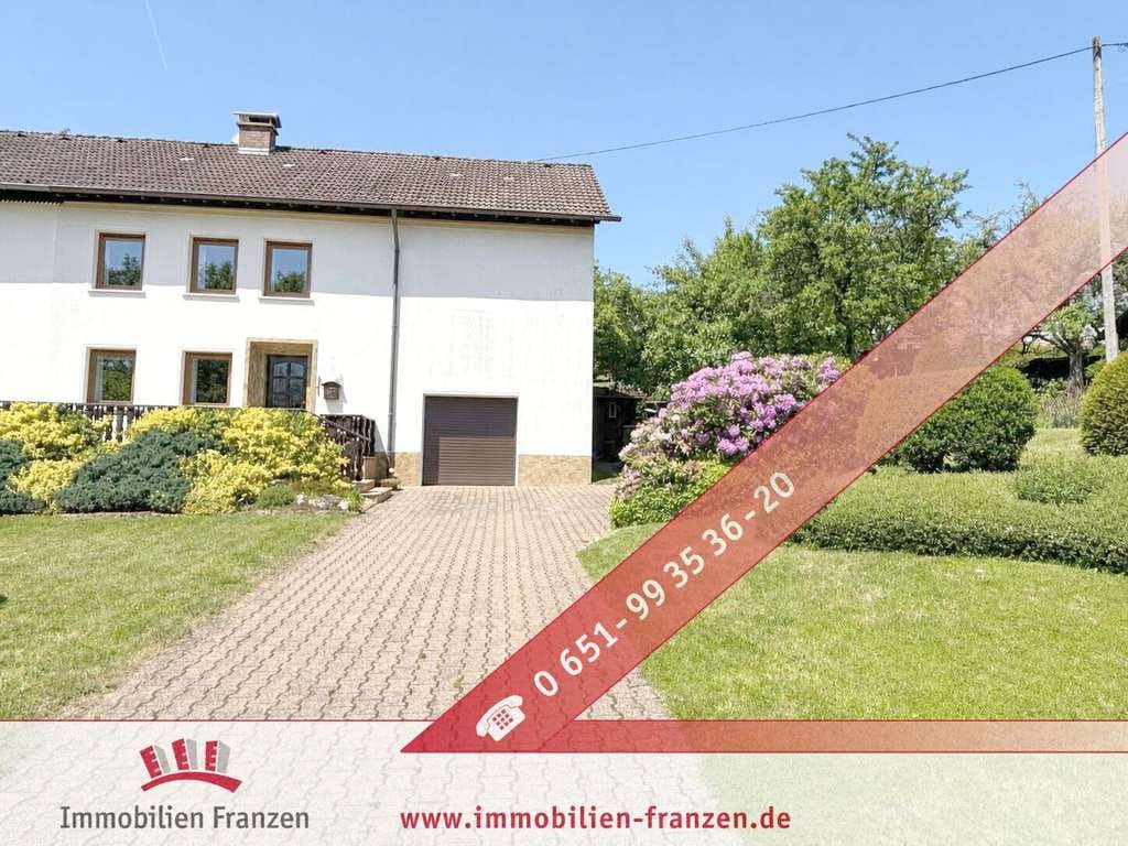 Immobilie in Greimerath - Gepflegte Doppelhaushälfte mit Terrasse, schönem Garten, Keller, großer Garage und viel Stauraum - Bild 0