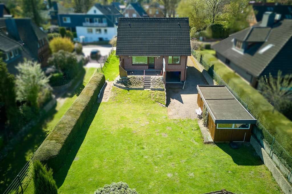 Immobilie in Hanstedt - Familienfreundliches Wohnen mit großem Grundstück und freiem Blick ins Grüne in Hanstedt - Bild 2