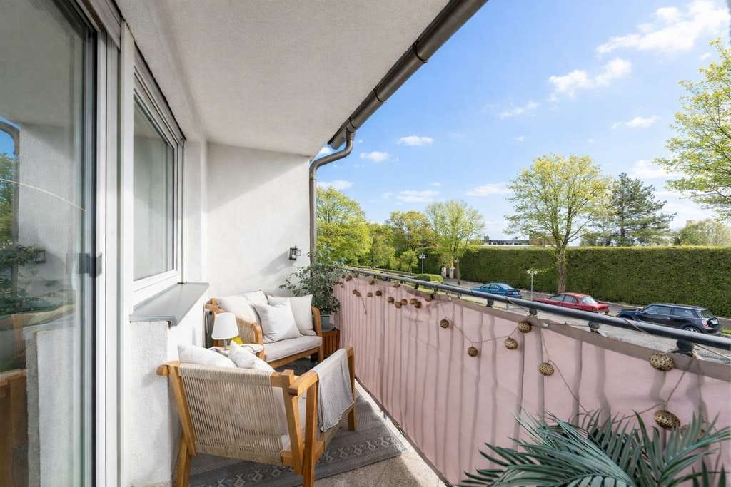Immobilie in Neuried - Helle und einladende Wohnung mit Balkon und Einzelgarage - Bild 2