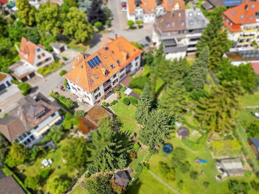 Immobilie in Kenzingen - Charmantes Mehrfamilienhaus mit großem Garten in Kenzingen - Bild 4
