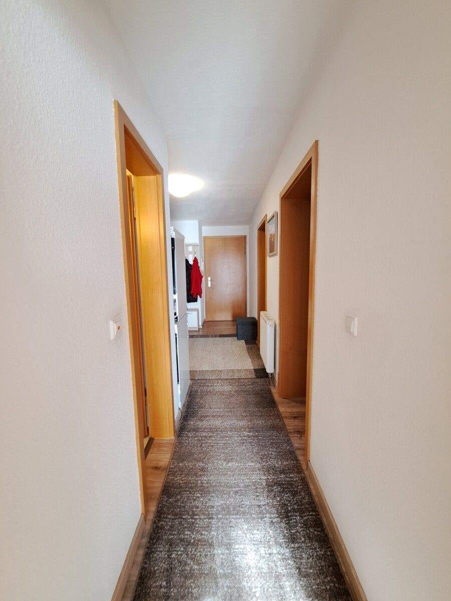 Immobilie in Mulda/Sachsen - Stilvolle Erdgeschoss-Wohnung zum Verkauf: 4 Räume, Tiefgarage, großzügige Terrasse in Mulda/Sa.! - Bild 2