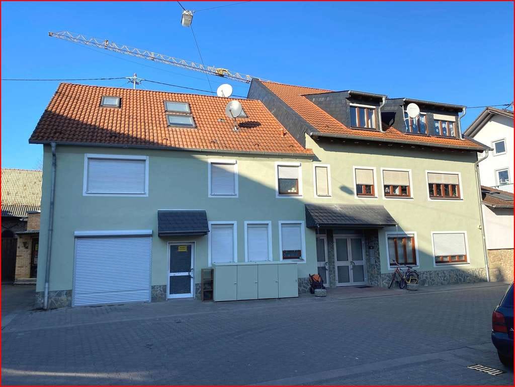 Immobilie in Wöllstein - 5 Parteienhaus mit Lagerhalle in Wöllstein - Bild 1