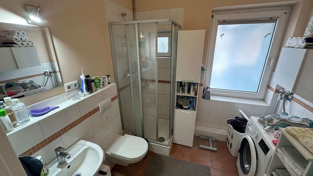 Immobilie in Moorrege - Solides, kleines Mehrfamilienhaus mit Vollkeller und Doppelgarage in Moorrege - Bild 2