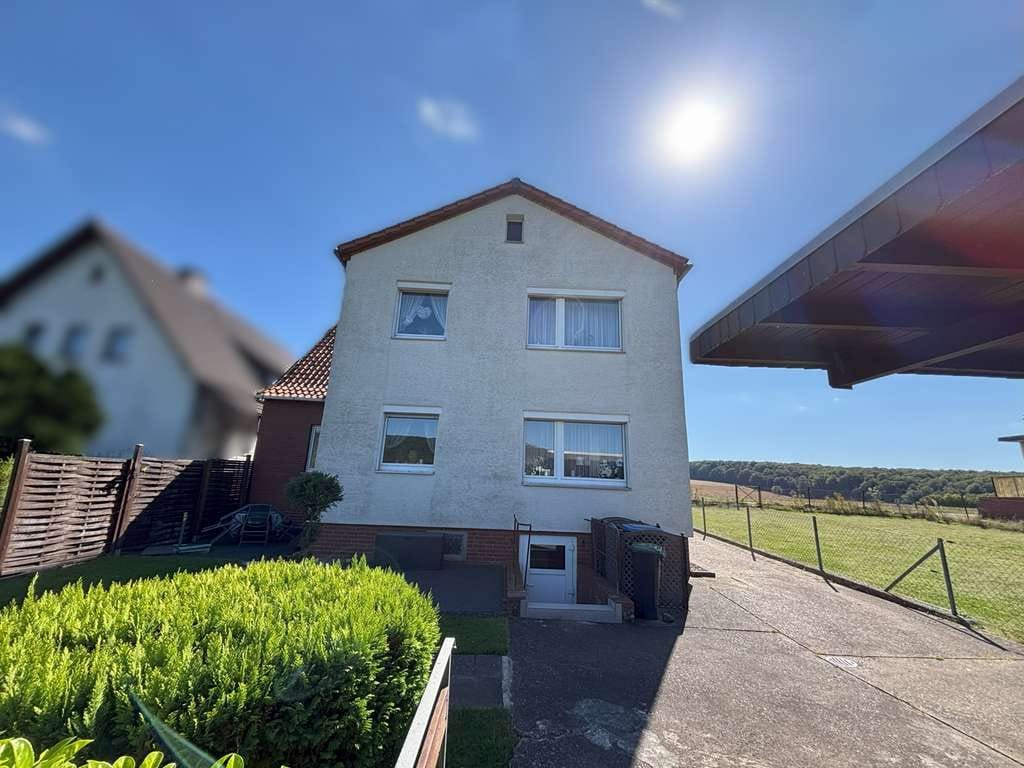 Immobilie in Bad Münder am Deister - Feldrandlage am Deister: Einfamilienhaus mit Einliegerwohnung und tollem Grundstück! - Bild 2