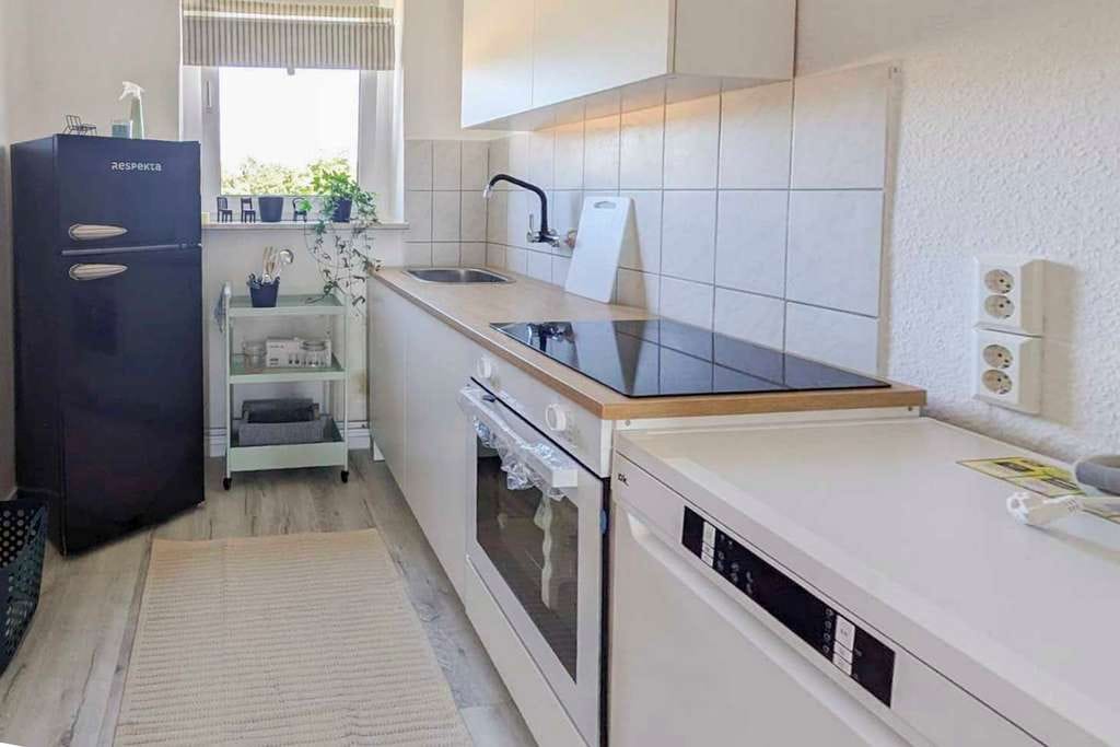 Immobilie in Süderholz - Attraktives Anlagepaket mit Eigennutzoption: 2x 3-Zimmer-Wohnungen + Garagen, Garten & Bungalow  - Bild 0