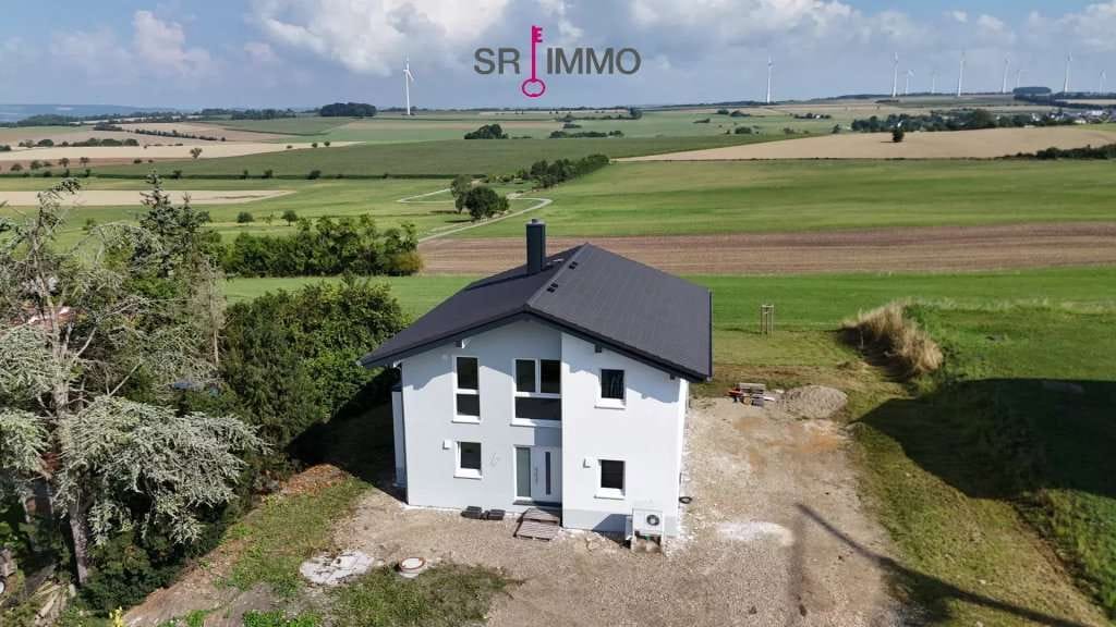 Immobilie in Biesdorf - Traumblick inklusive: Stilvoller Neubau nahe Luxemburg – Ihr neues Zuhause in Biesdorf! - Bild 0